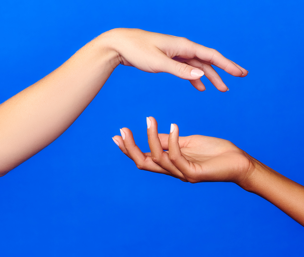 Two hands hovering against eachother.